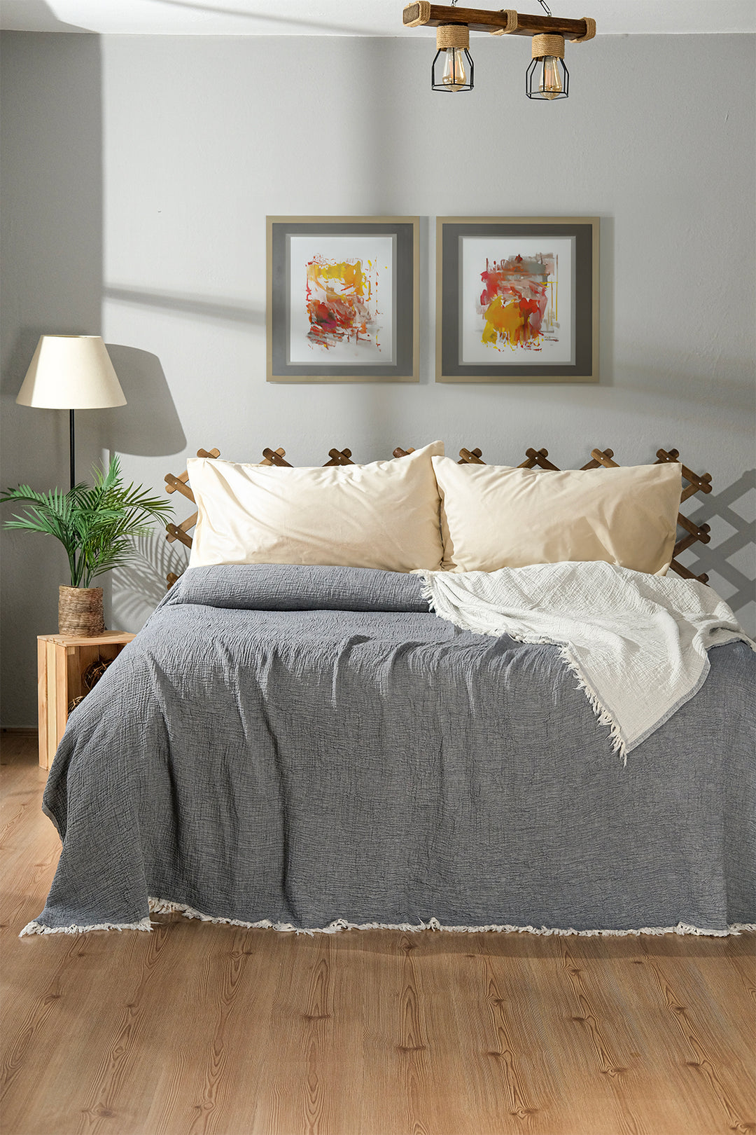 Gray bed blanket on bed