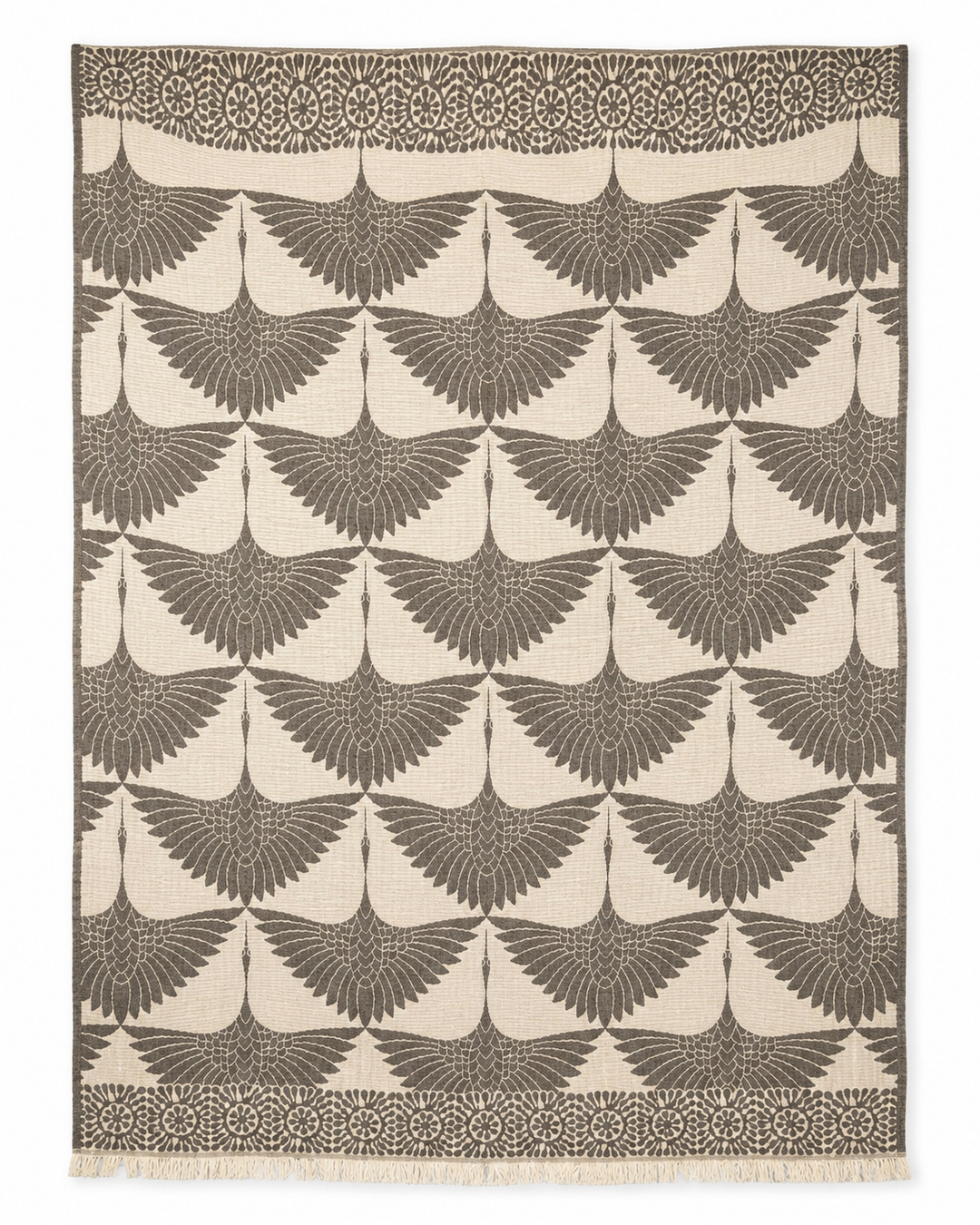 Crane Muslin Throw Blanket Natural Border by turkanhome.com—a reversible Turkish cotton throw featuring stylized dark gray cranes in flight on a light beige background, accented with a decorative floral border along the top and bottom edges.